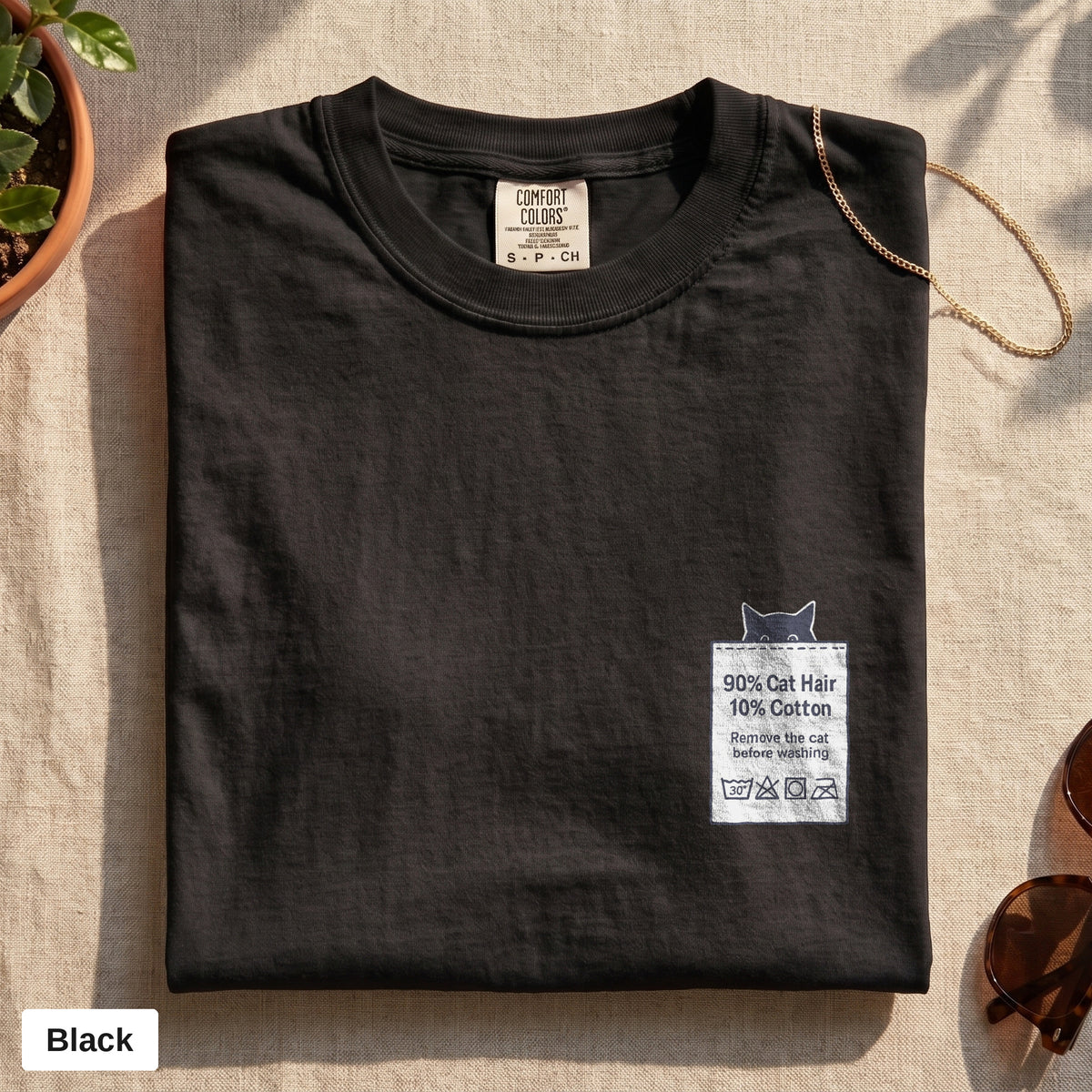 90% Cat Hair 10% Cotton pocket print tee, Comfort Colors 1717 in Black, folded flat lay