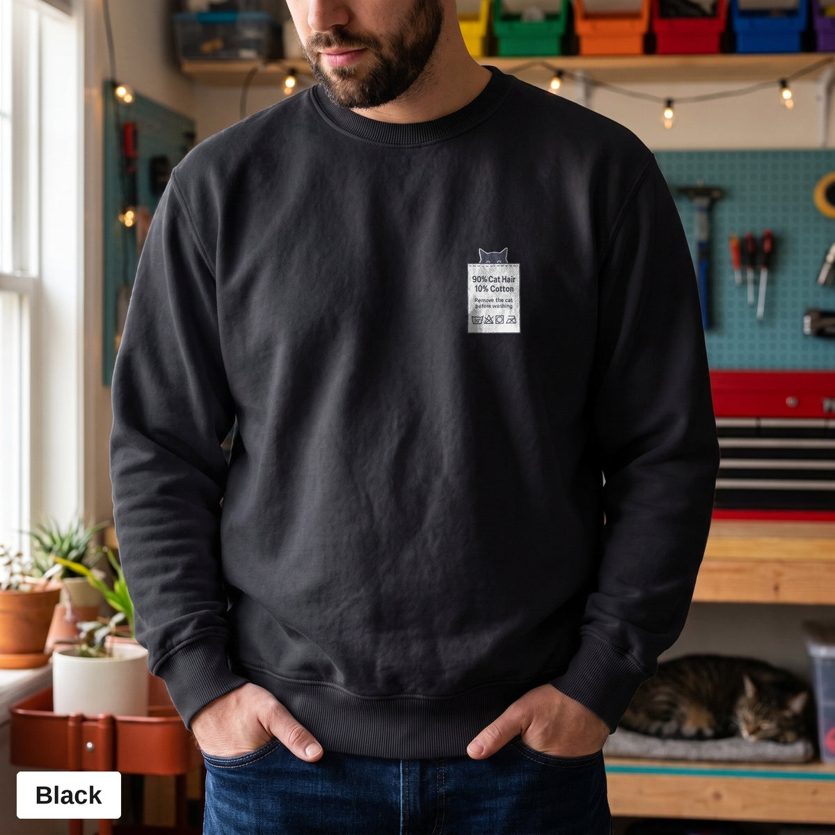 Black Comfort Colors crewneck sweatshirt worn by a man, 90% Cat Hair 10% Cotton design printed on the chest