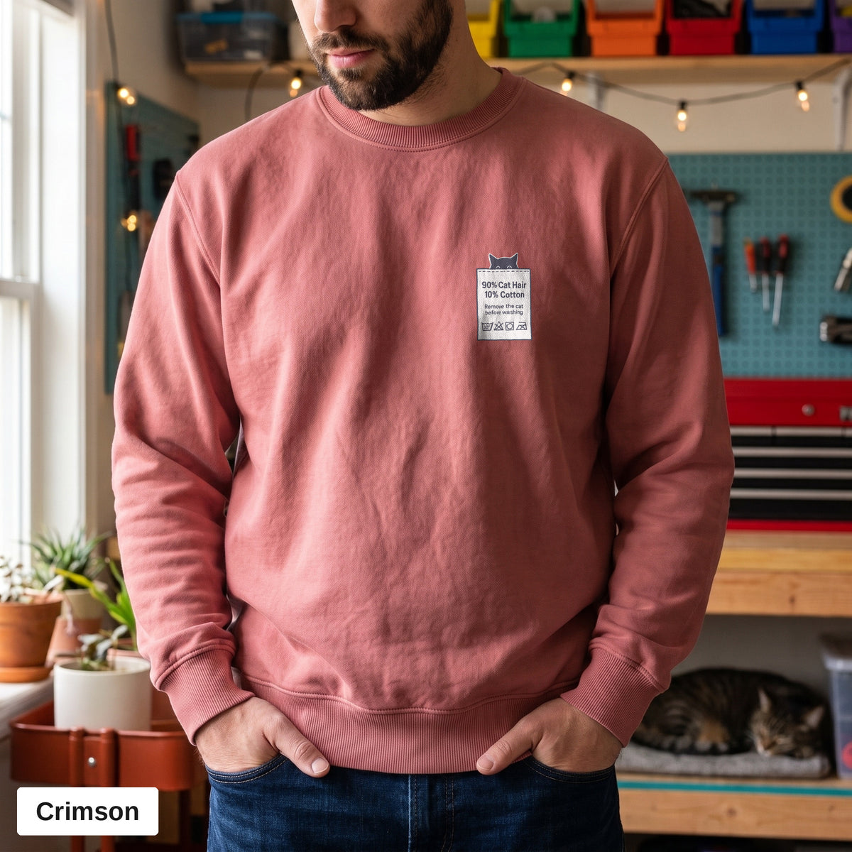 Crimson Comfort Colors crewneck sweatshirt worn by a man, 90% Cat Hair 10% Cotton design printed on the chest