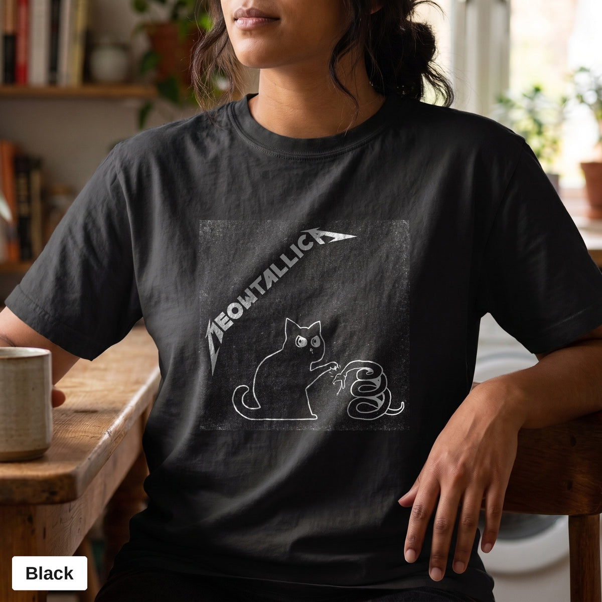 Metal cat and snake graphic tee, Comfort Colors 1717 in Black, worn by a woman
