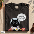 Houston We Have A Pollen cat astronaut tee, Comfort Colors 1717 in Black, folded flat lay