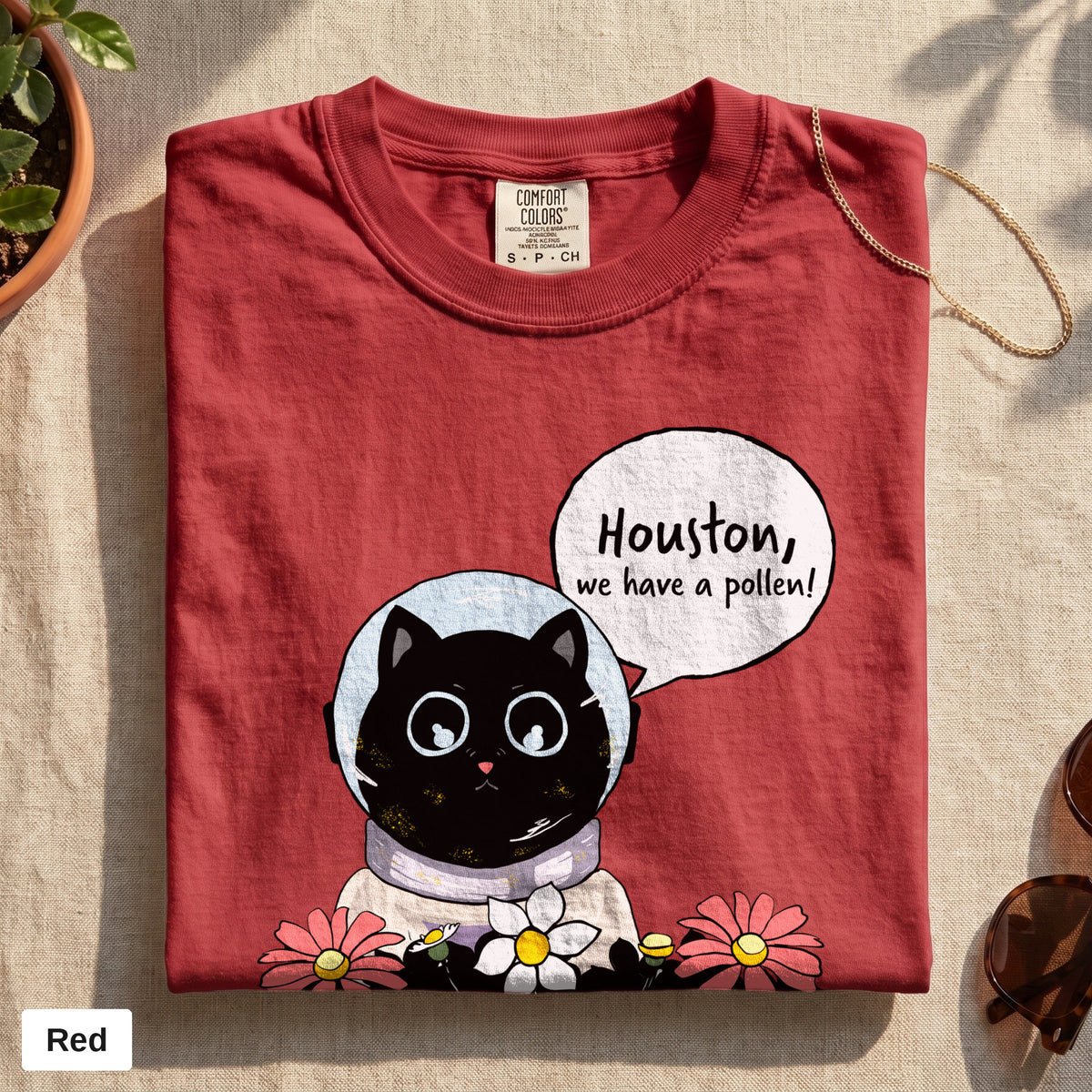 Houston We Have A Pollen cat astronaut tee, Comfort Colors 1717 in Red, folded flat lay