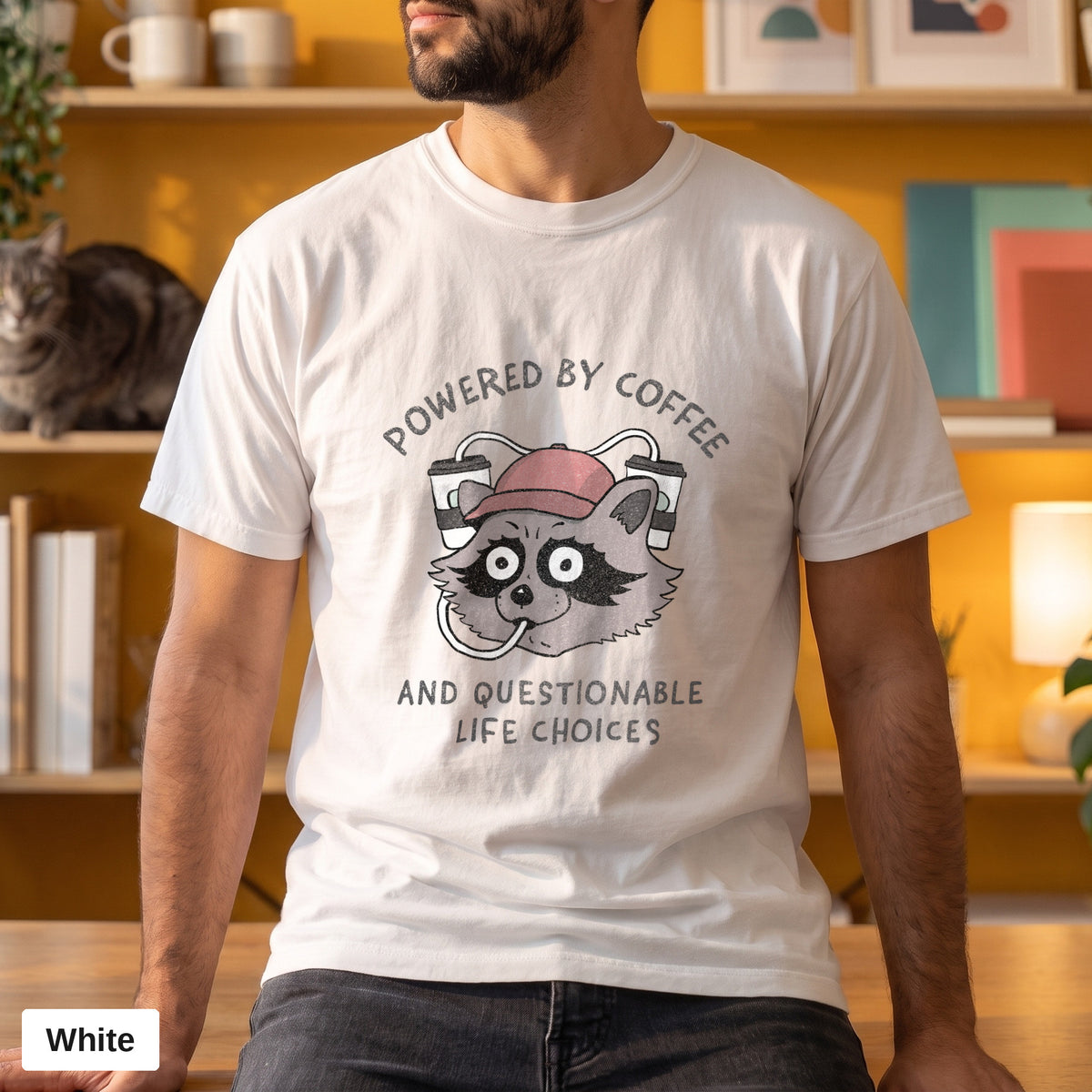 Powered By Coffee And Questionable Life Choices raccoon tee, Comfort Colors 1717 in White, worn by a man