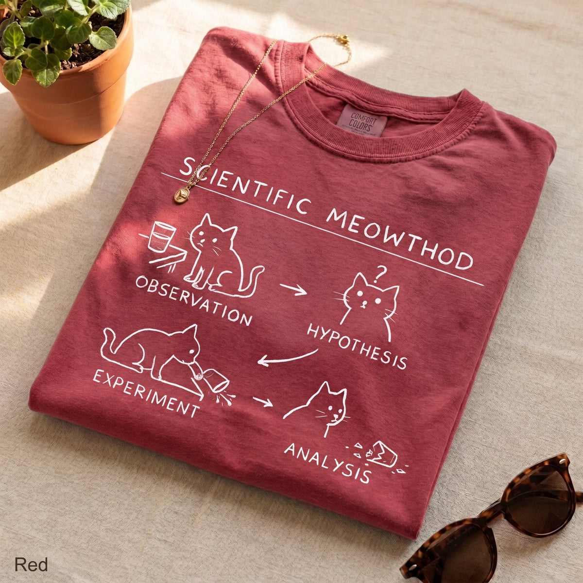 Scientific Meowthod Comfort Colors t-shirt folded flat lay in Red