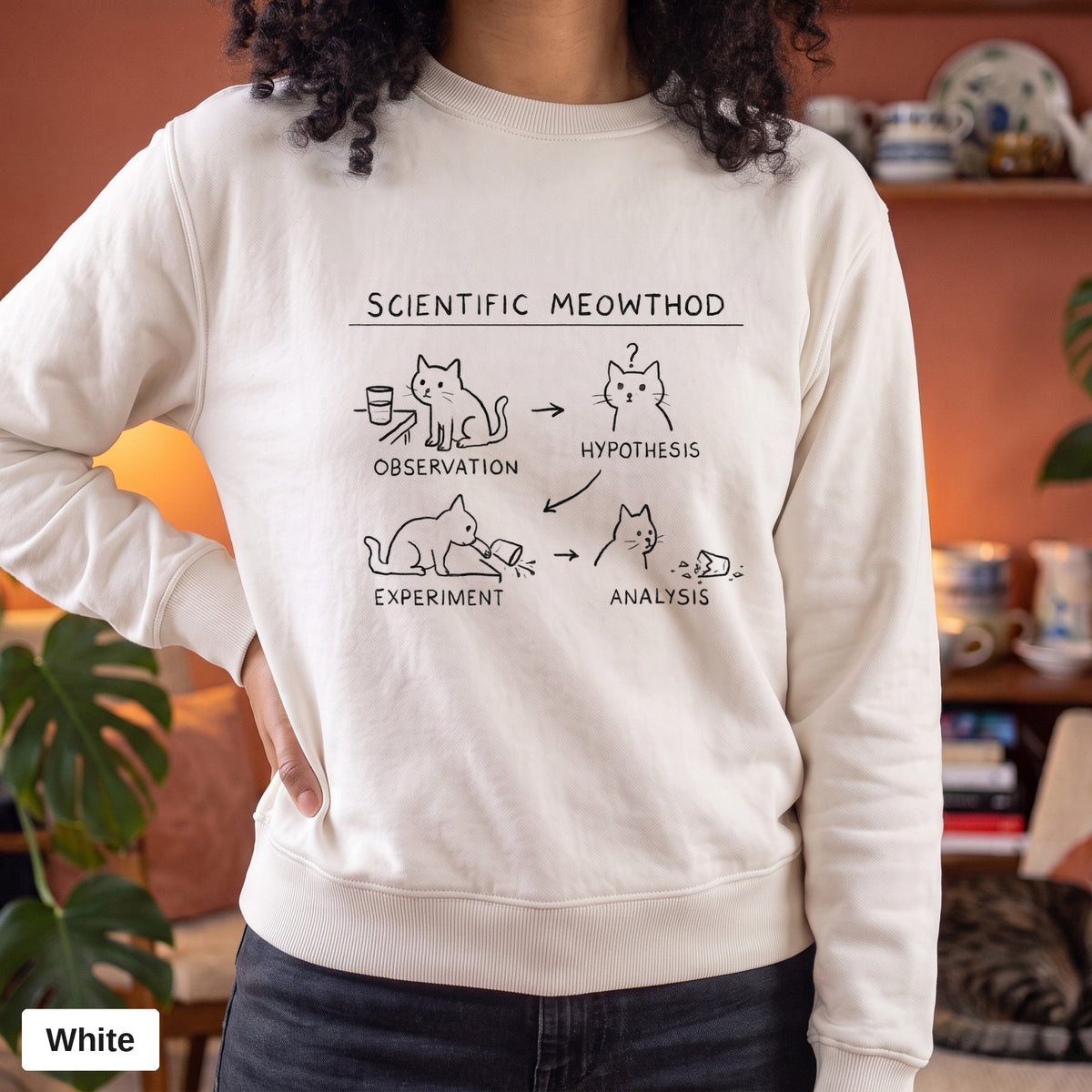 White Comfort Colors crewneck sweatshirt worn by a model, Scientific Meowthod cat science diagram printed on the chest